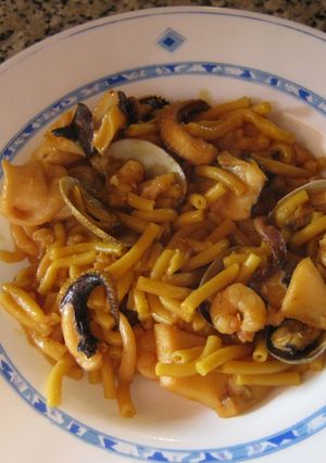 A picture of Fideuà with Cuttlefish, Shrimp, and Clams.