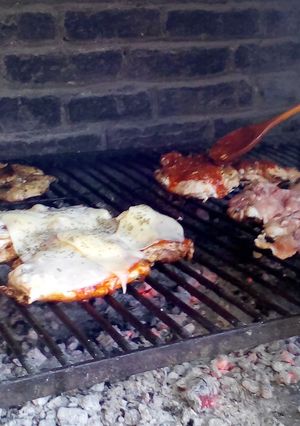 Una foto de Pollo a la pizza