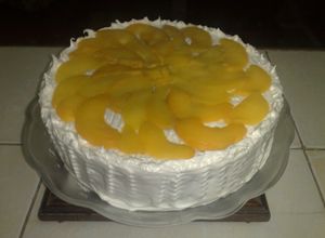 Una foto de Bizcocho húmedo con melocotones