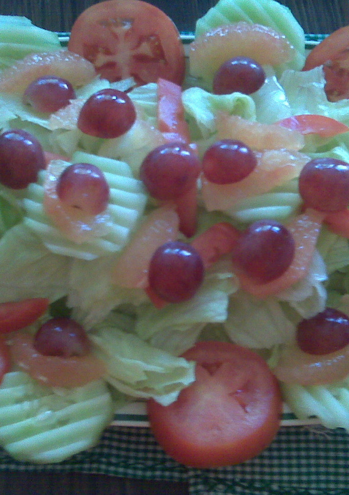 Una foto de Ensalada con aderezo de toronja