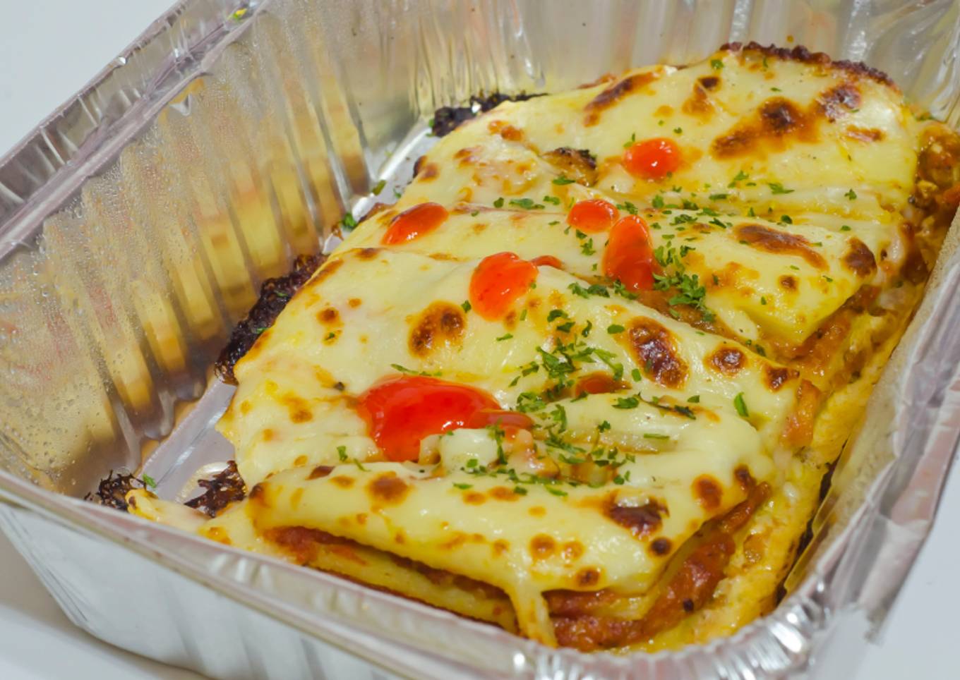 Lasaña de pollo y queso