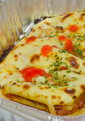 Una foto de Lasaña de pollo y queso