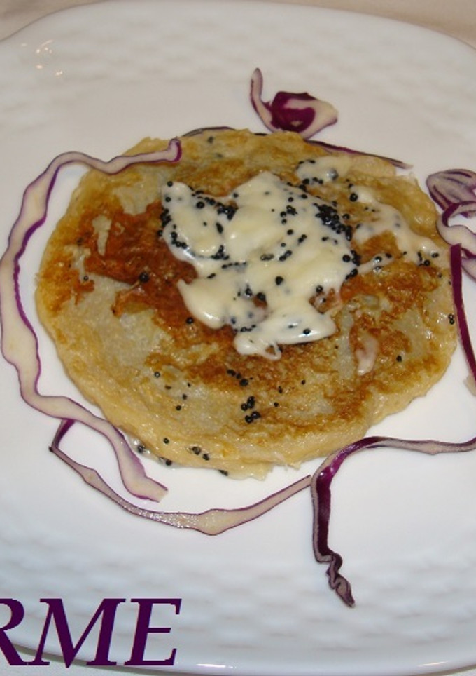 Una foto de Tortilla de queso y caviar