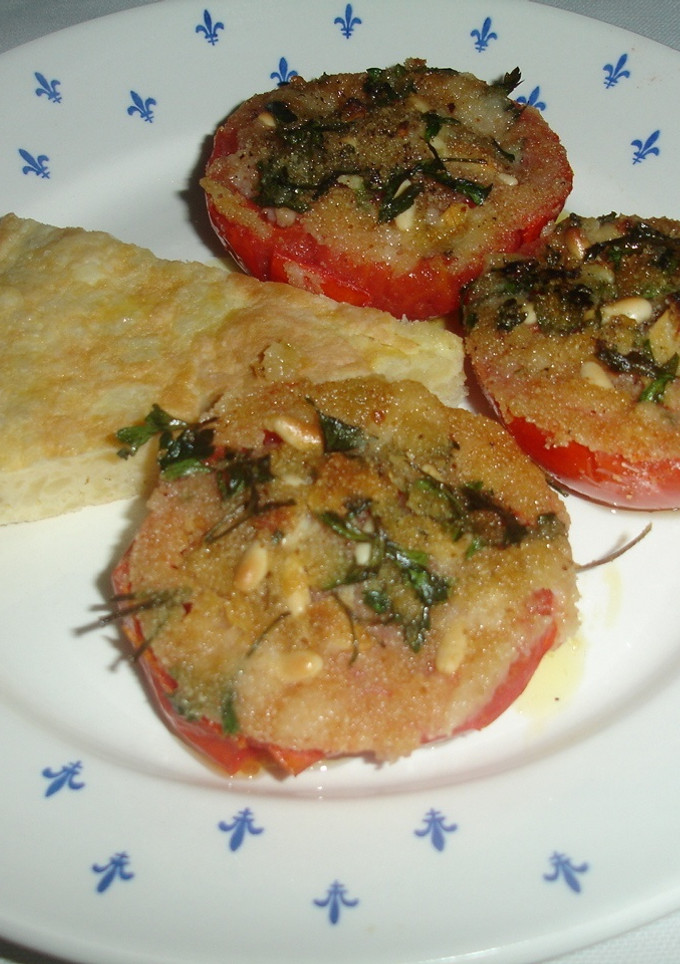 Una foto de Tomates maduros a la provenzal
