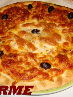 Una foto de Pizza suprema
