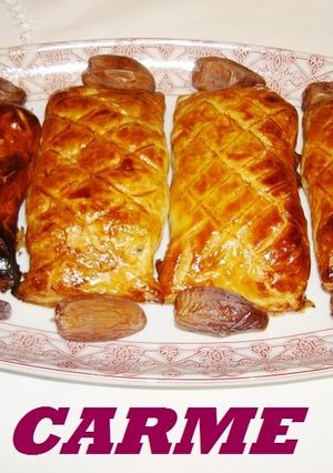 Una foto de Solomillos en hojaldre con champiñones, dátiles y beicon