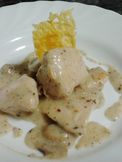 Una foto de Pollo en salsa de trufa blanca