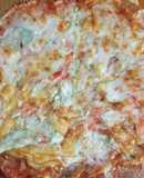 Pizza integral de quesos al aroma de orégano