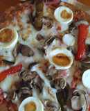 Pizza integral de jamón asado