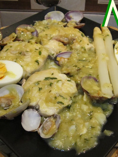 Una foto de Merluza a la vasca en salsa verde