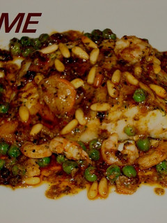 Una foto de Bacalao con gambitas y piñones