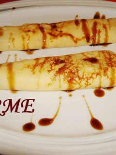 Una foto de Crêpes de queso y caviar