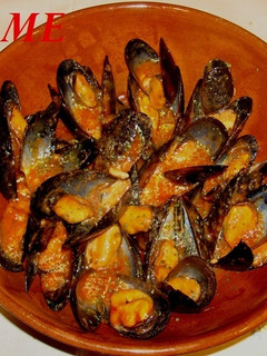 Una foto de Mejillones a la marinera picantes