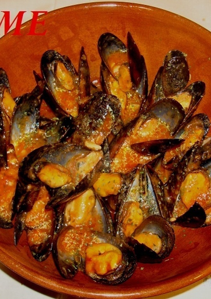 Una foto de Mejillones a la marinera picantes