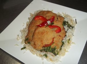 Una foto de Filet de merluza en croute de queso