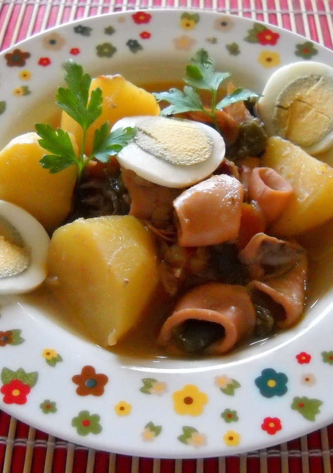 Una foto de Chipirones con patatas y ñoras