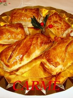 Una foto de Hojaldres de jamón, queso y dulce de membrillo