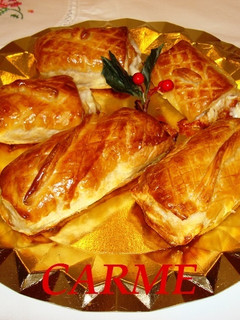 Una foto de Hojaldres de jamón, queso y dulce de membrillo