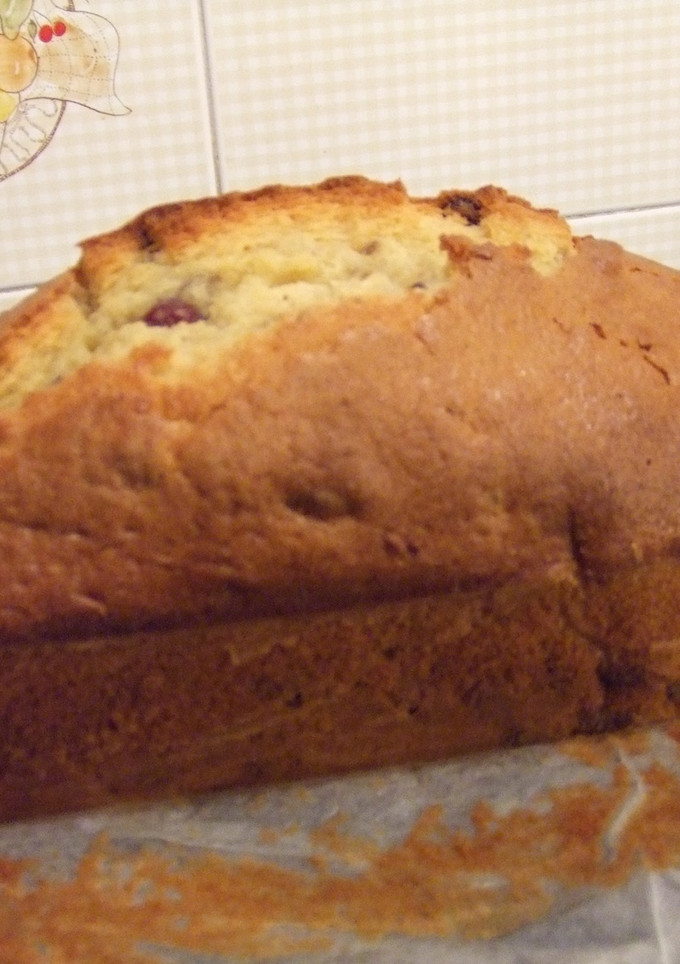 Una foto de Cake de vainilla y maíz con arándanos rojos