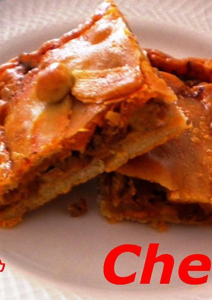 Una foto de Empanada de picadillo y queso cheddar