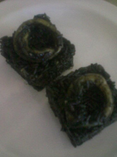 Una foto de Risotto con frutos de mar y tinta de calamar