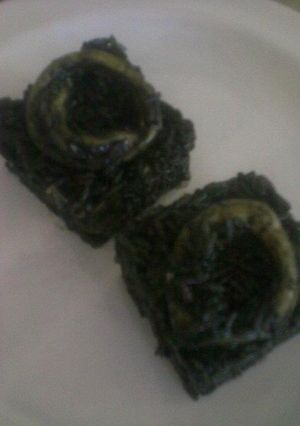 Una foto de Risotto con frutos de mar y tinta de calamar