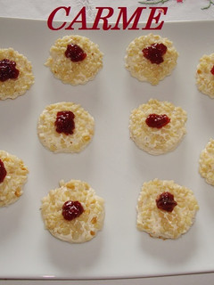 Foto principal de Canapés de queso a las finas hierbas y almendras
