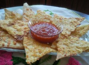 Una foto de Tostaditas de queso con ajonjoli y paprika