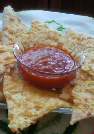 Una foto de Tostaditas de queso con ajonjoli y paprika