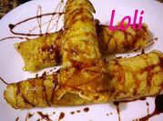 Una foto de frixuelos con chocolate