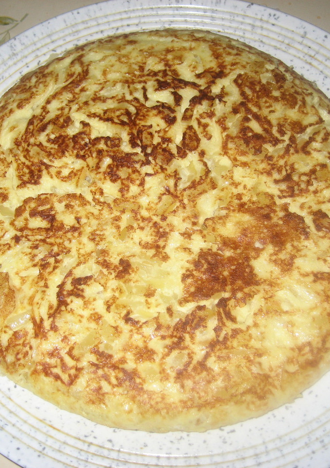 Una foto de Tortilla de patata y calabacín