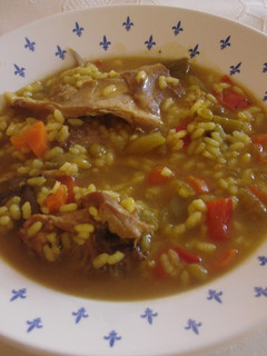 Una foto de Arroz caldoso con conejo (de casa)