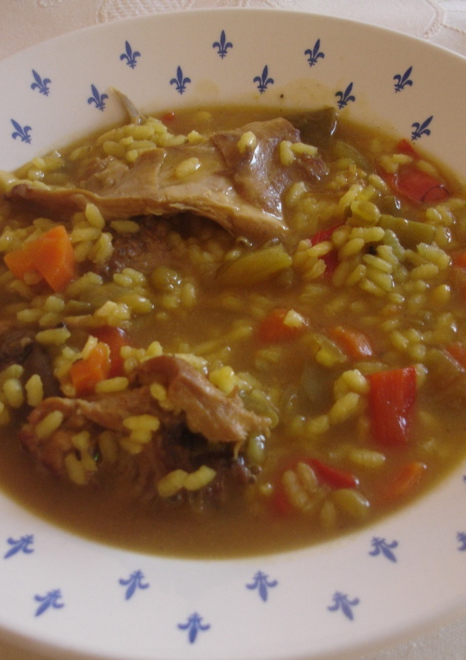 Una foto de Arroz caldoso con conejo (de casa)