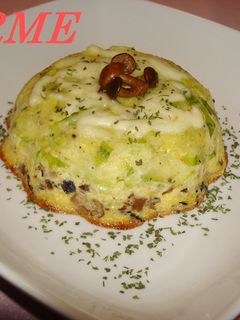 Una foto de Pastel de calabacín y setas