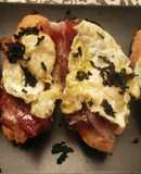 Tostada de jamón ibérico y huevo de perdiz con trufa