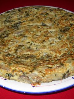 Una foto de Tortilla de setas y acelgas