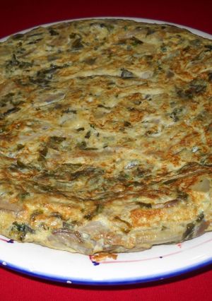 Una foto de Tortilla de setas y acelgas