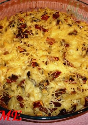 Una foto de Macarrones con salteado de setas y jamón