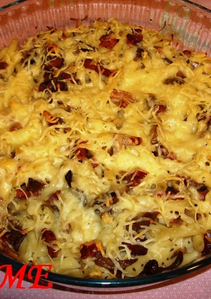 Una foto de Macarrones con salteado de setas y jamón