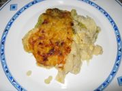 Una foto de coliflor gratinada con bechamel
