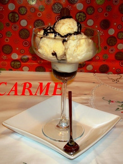 Una foto de Mousse de mandarina helado