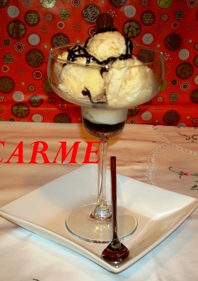 Una foto de Mousse de mandarina helado