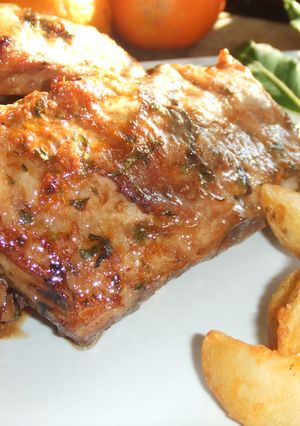Una foto de Costillas de cerdo ibérico con salsa de mandarinas