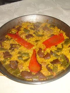 Una foto de Paella de magro y rovellones