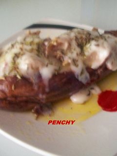 Una foto de Berenjenas gratinadas con queso de cabra al vino tinto de Murcia