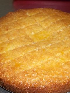 Una foto de Torta de naranja almibarada