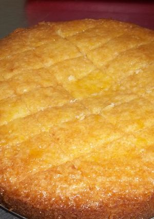 Una foto de Torta de naranja almibarada