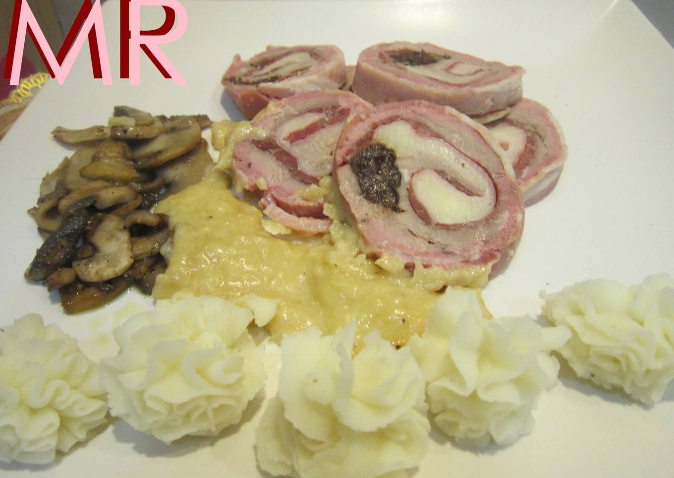Solomillo ibérico relleno ibérico con salsa de membrillo