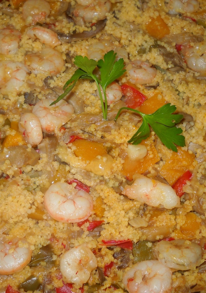 Una foto de Mijo con gambas y setas