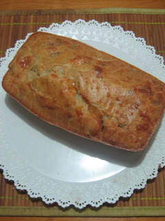 Una foto de Pastel de queso, nueces y pasas